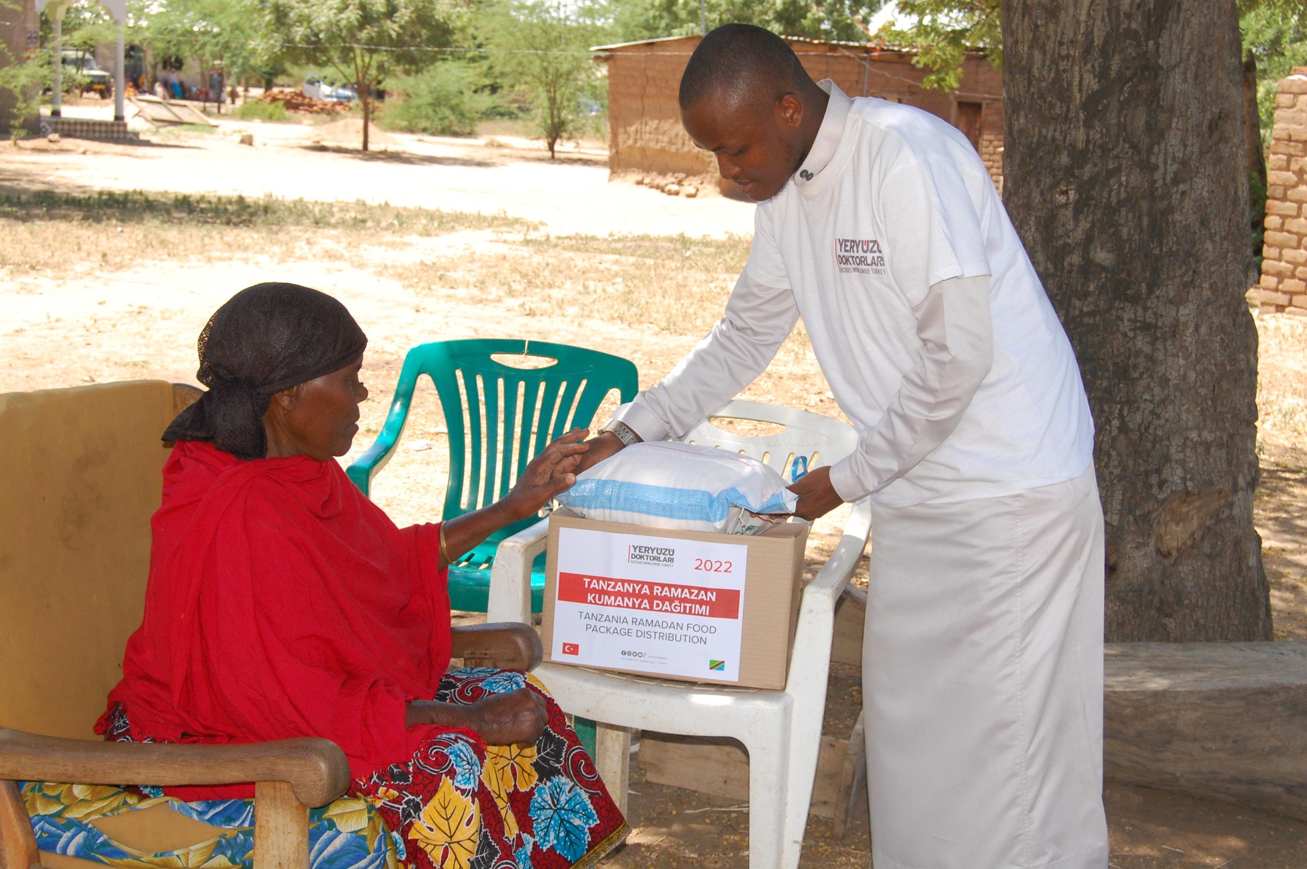 Community gathering for food distribution program in Tanzania